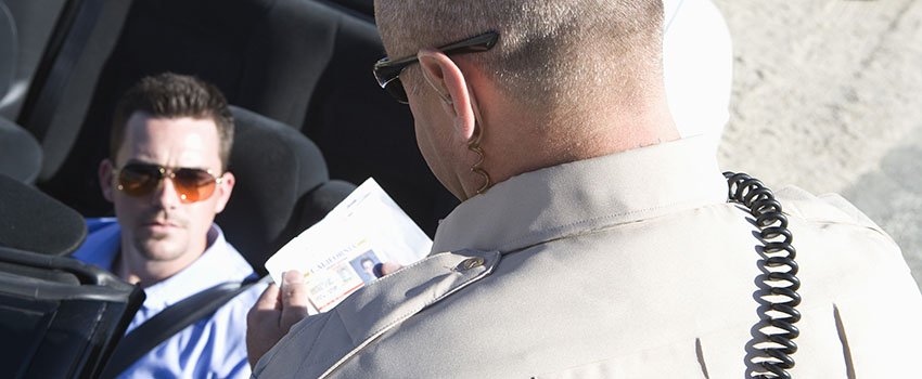 Nervous Man Talking to Sheriff