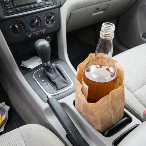 Does the Arizona Open Container Law Apply to Passengers in a Moving Vehicle?